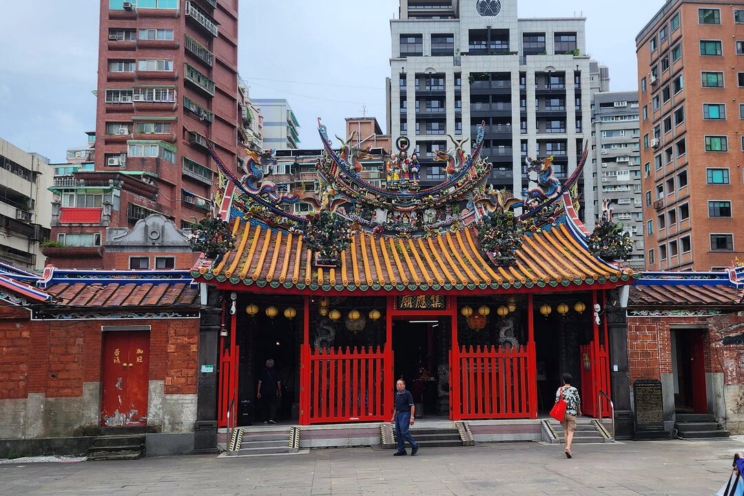 高明見教授的多重角色與貢獻